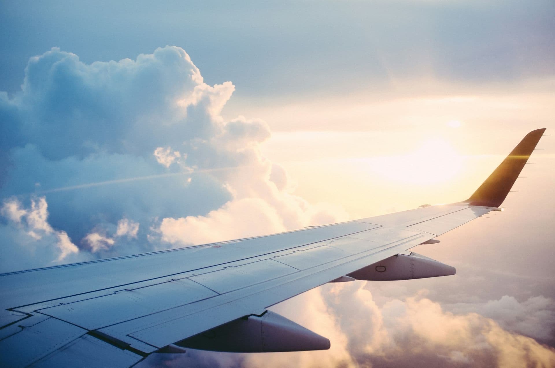 Traveler overlooking a scenic destination at sunset
